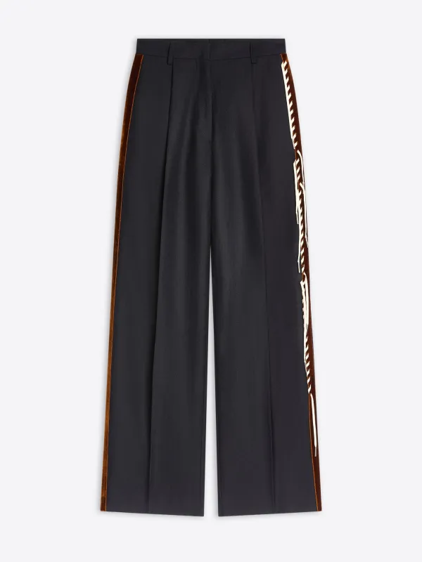 Embellished tuxedo pants sold by Dries Van Noten