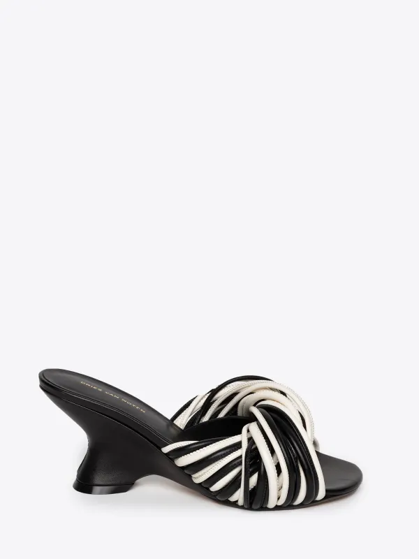 Open-toe leather mules sold by Dries Van Noten