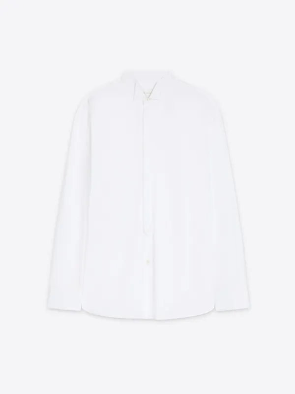 Oversized tuxedo shirt sold by Dries Van Noten