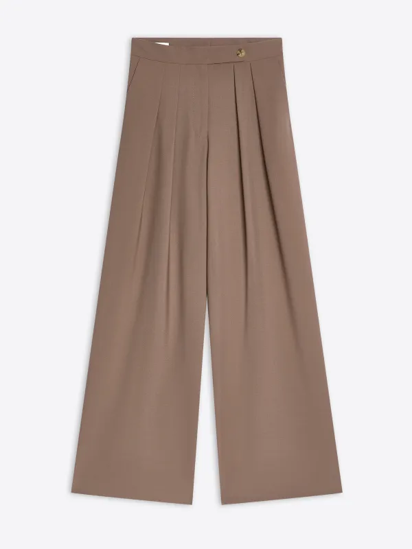Wide pleated pants sold by Dries Van Noten
