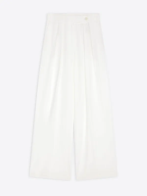 Wide pleated pants sold by Dries Van Noten