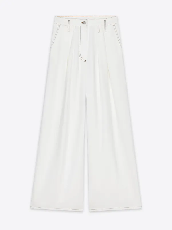 Wide pleated jeans sold by Dries Van Noten