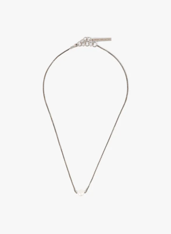 Pearl stud necklace sold by Dries Van Noten