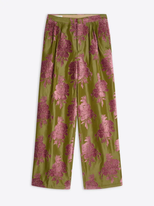 Pleated fil coupé pants sold by Dries Van Noten