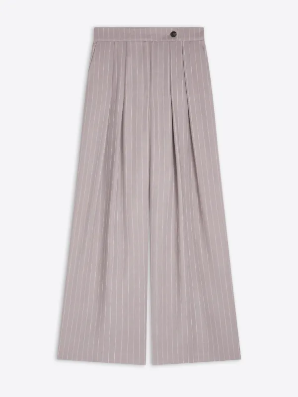 Wide pleated pants sold by Dries Van Noten