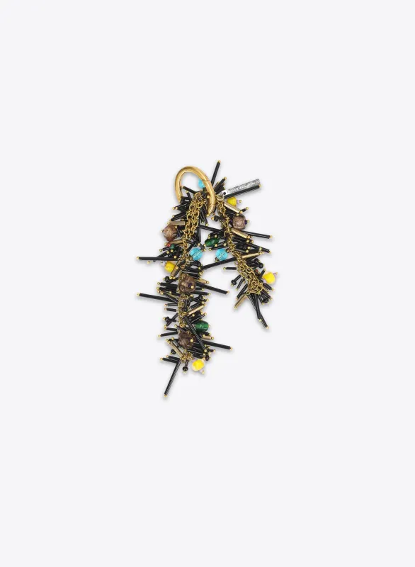 Embroidered bag charm made by Dries Van Noten