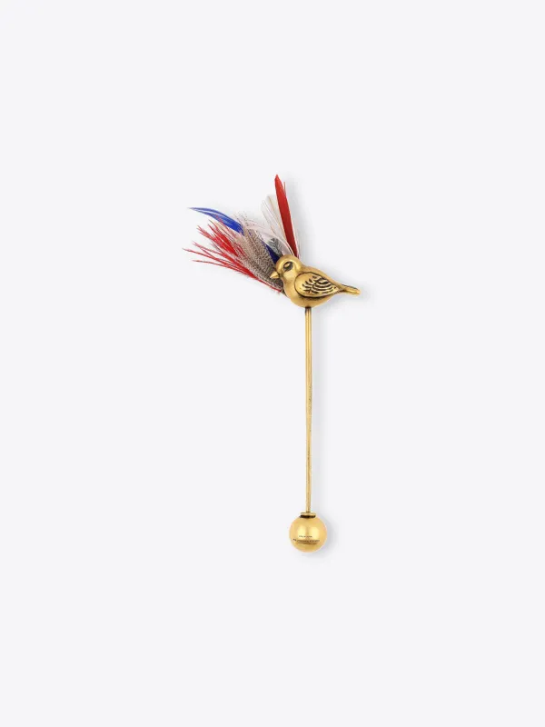 Gold feather brooch made by Dries Van Noten