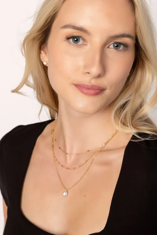 Triple Strand Necklace with Pearl Pendant sold by Eclipse