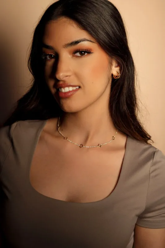 Rhinestone Necklace with Mini Clovers sold by Eclipse