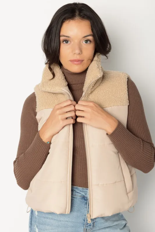 Sherpa Trimmed Puffer Vest sold by Eclipse