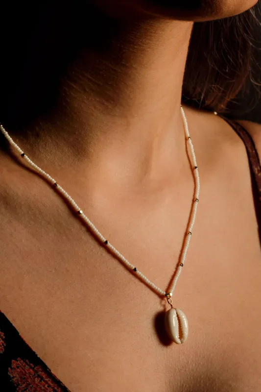 Beaded Necklace with Shell Pendant sold by Eclipse