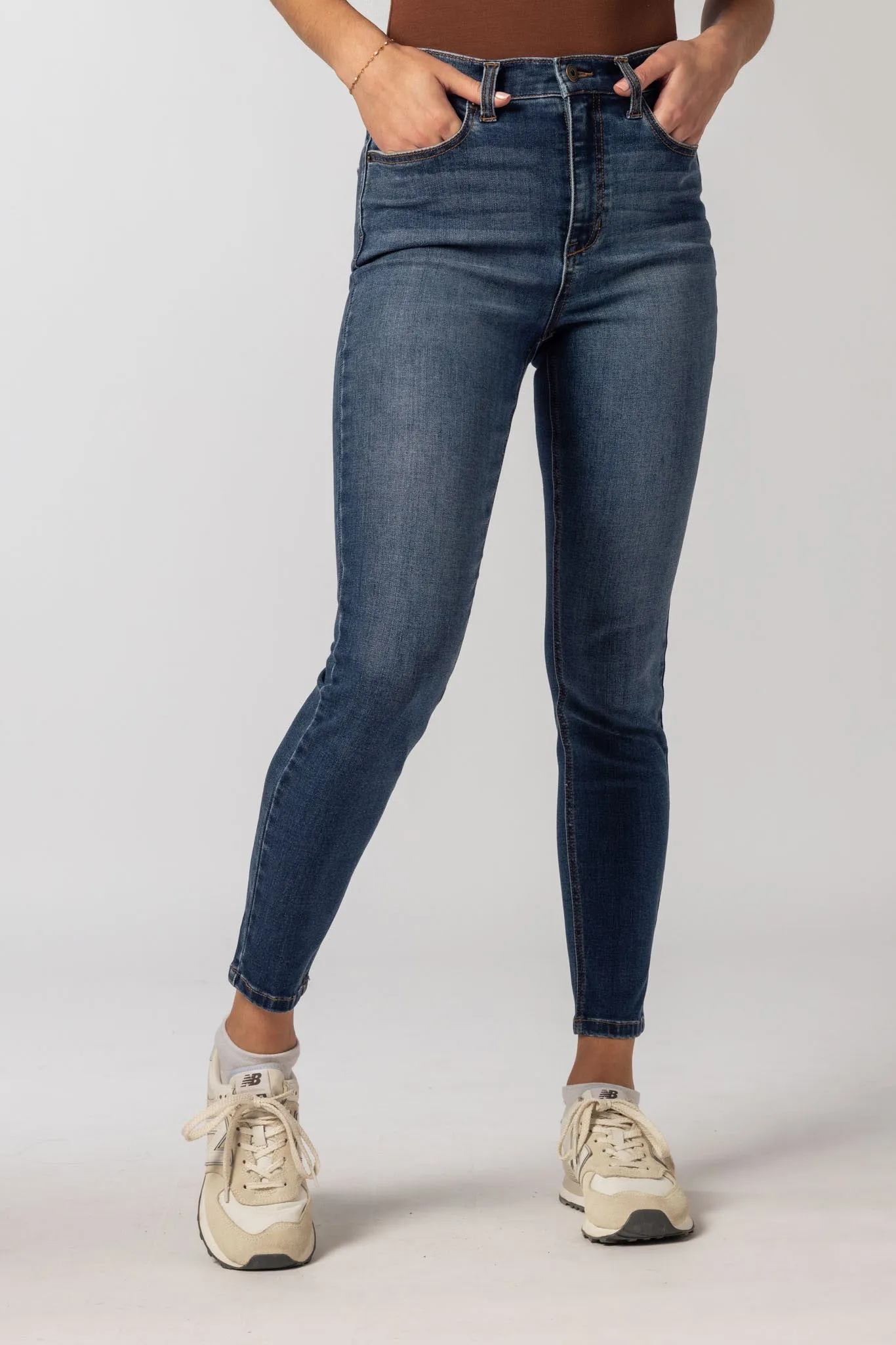 Celebrity Pink Mid-Wash High-Rise 28" Skinny sold by Eclipse