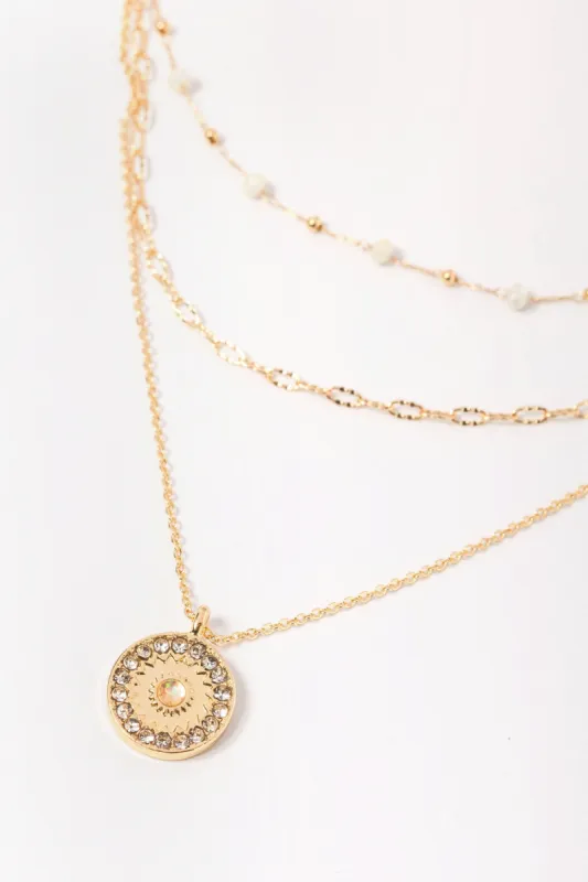 Triple Strand Necklace with Beads and Rhinestone Pendant sold by Eclipse