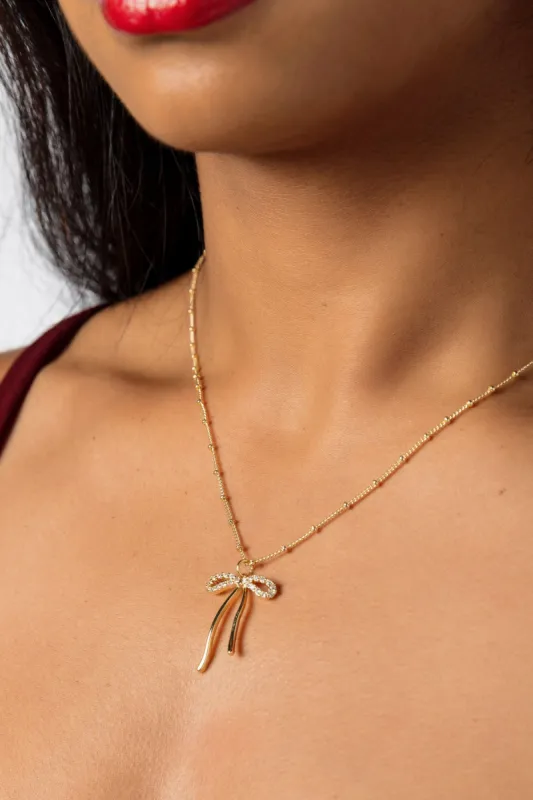 Beaded Chain Bow Necklace sold by Eclipse