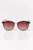 Rounded Plastic Sunglasses with Metal Trim sold by Eclipse