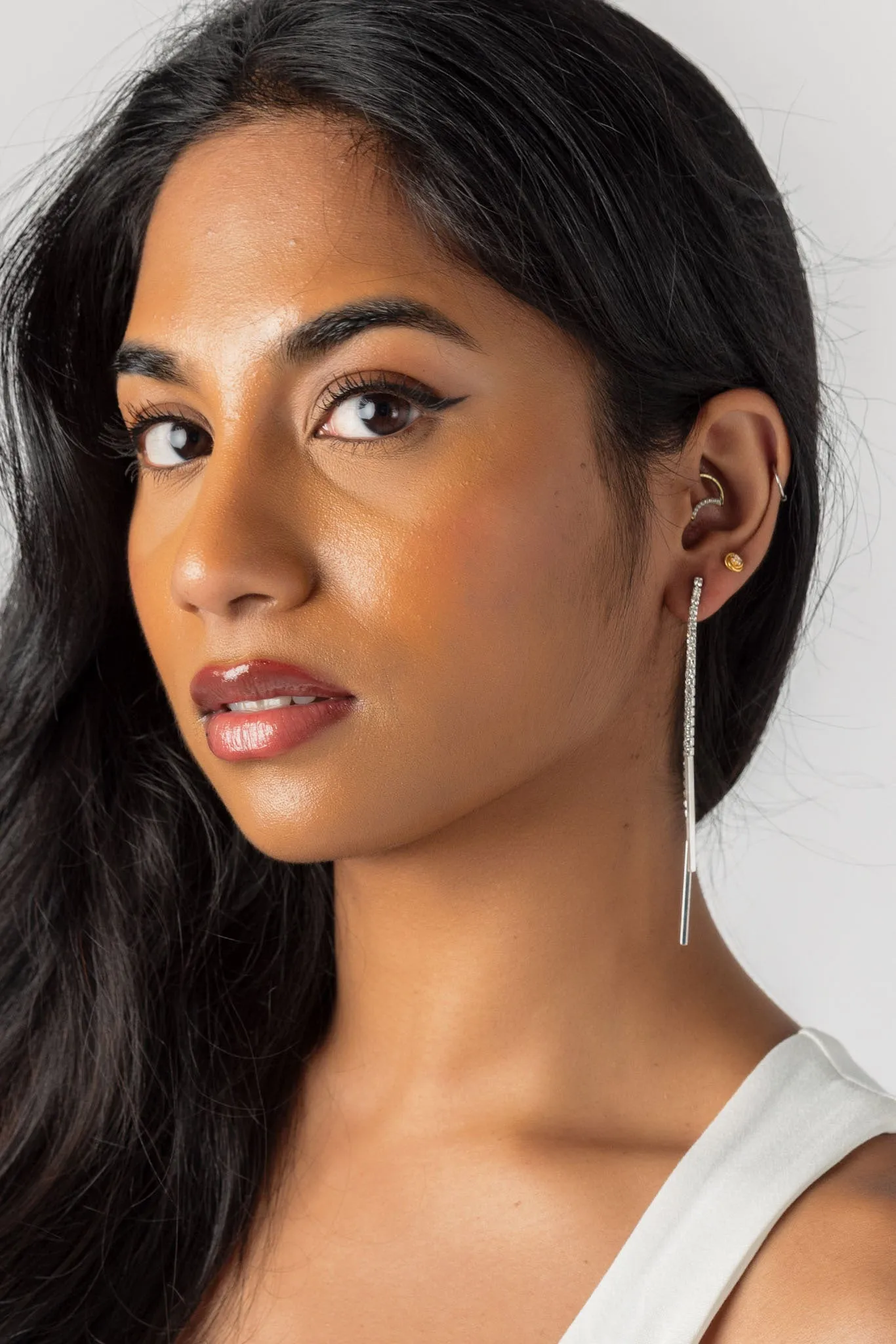 Twinkling Rhinestone Linear Earrings sold by Eclipse