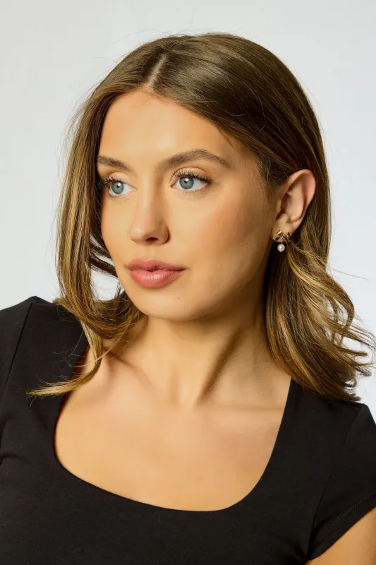 Pearl and Bow Earrings sold by Eclipse