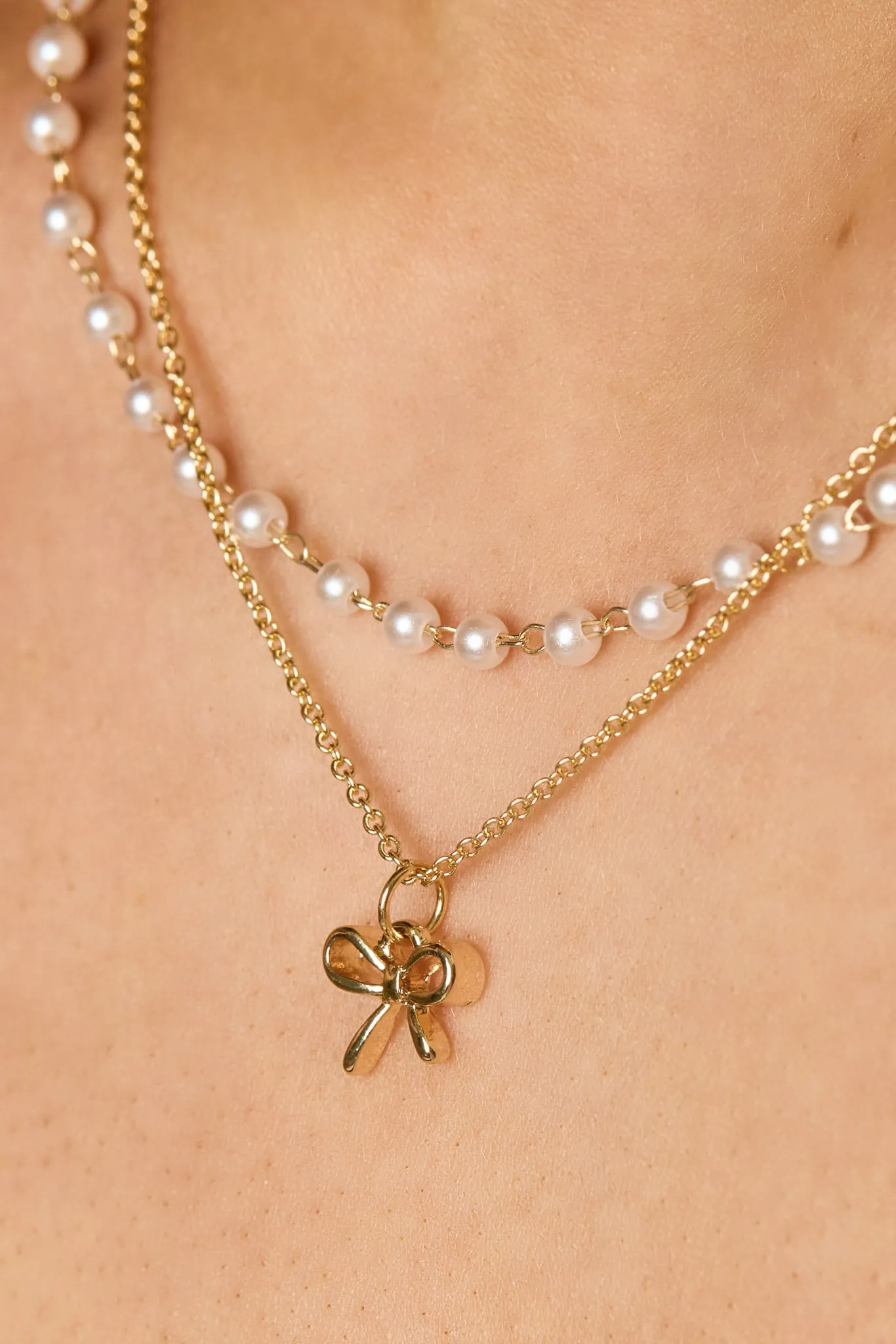 Pearl and Bow Double Necklace sold by Eclipse product image thumbnail 2