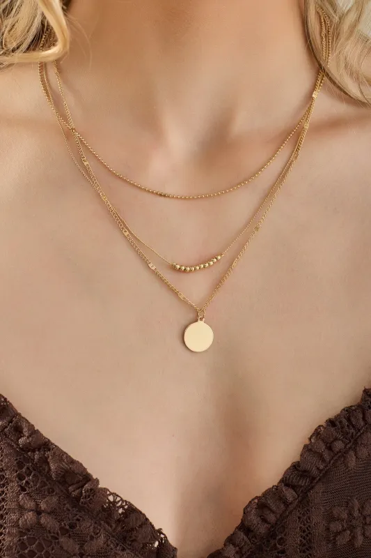 Triple Strand Necklace with Beads and Circle Pendant made by Eclipse