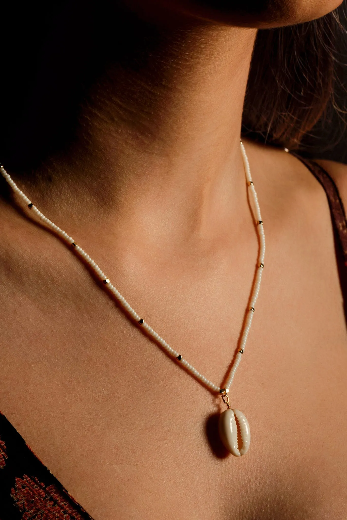 Beaded Necklace with Shell Pendant sold by Eclipse