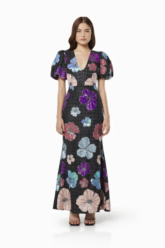 Minka Floral Sequin Maxi Gown In Black sold by Elliatt