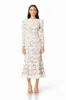 Calm Floral Lace Midi Dress In White sold by Elliatt