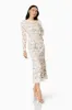 Calm Floral Lace Midi Dress In White sold by Elliatt