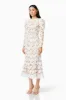 Calm Floral Lace Midi Dress In White sold by Elliatt