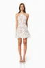 Valentina 3D Floral Mini Dress in White sold by Elliatt