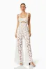 Windward Lace Jumpsuit In White sold by Elliatt