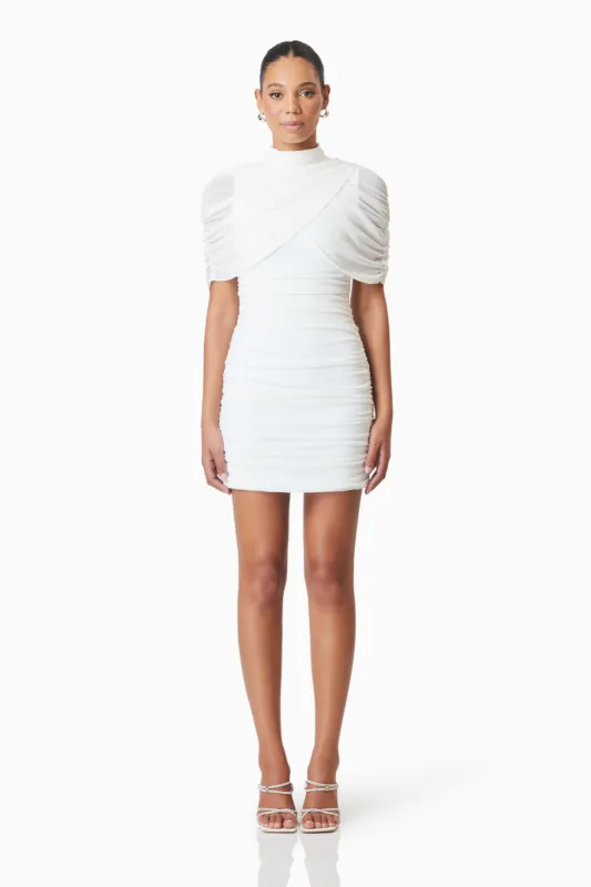 Phoebe Mesh Overlay Mini Dress In White sold by Elliatt