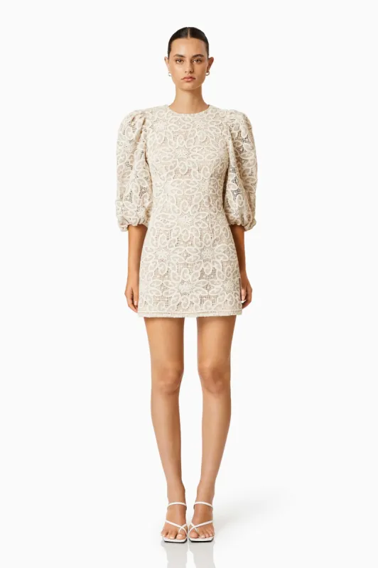 Cliffside Mini Lace Dress In White sold by Elliatt