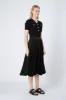 Tory Midi Pleated Skirt in Black sold by Elliatt