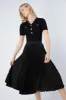 Tory Midi Pleated Skirt in Black sold by Elliatt