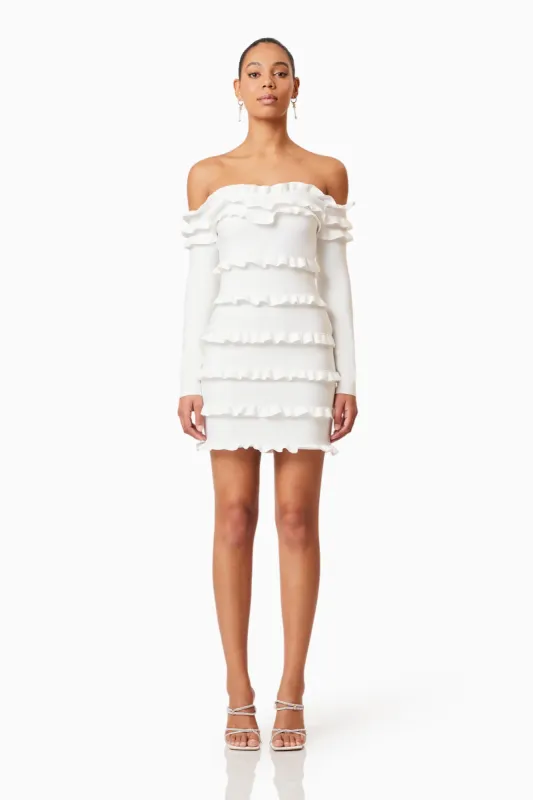 Kimberly Long Sleeve Frill Mini Dress in White sold by Elliatt