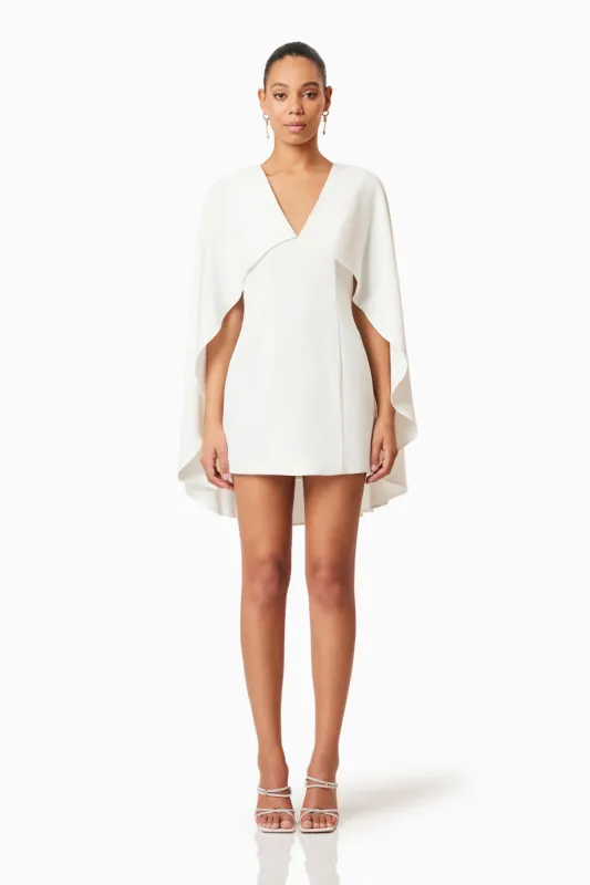 Lilydale Cape Mini Dress In White sold by Elliatt