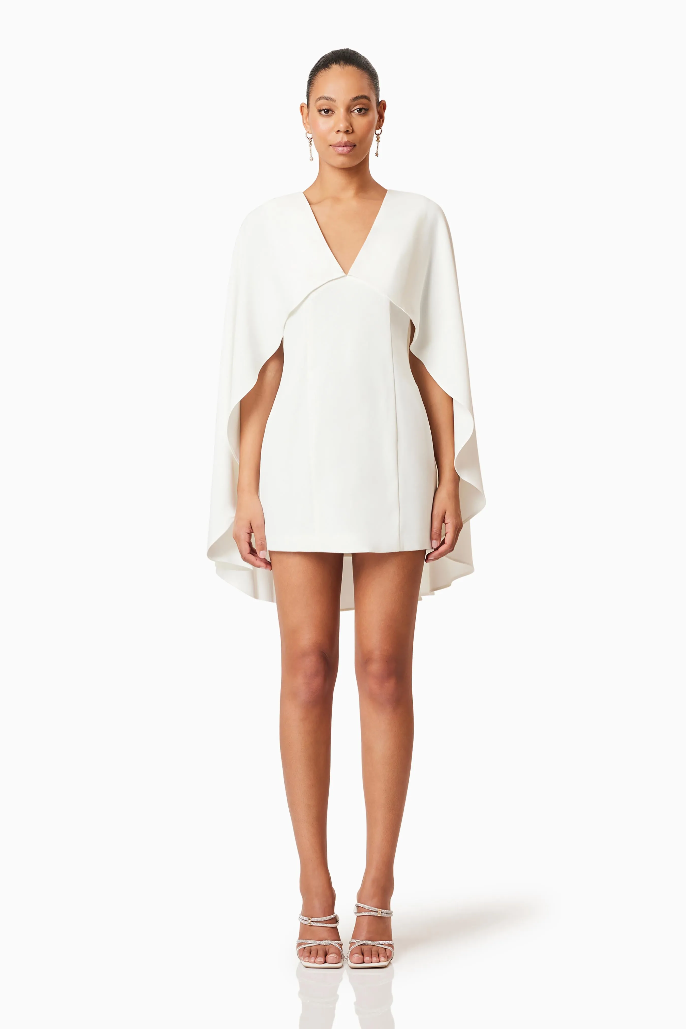 Lilydale Cape Mini Dress In White sold by Elliatt