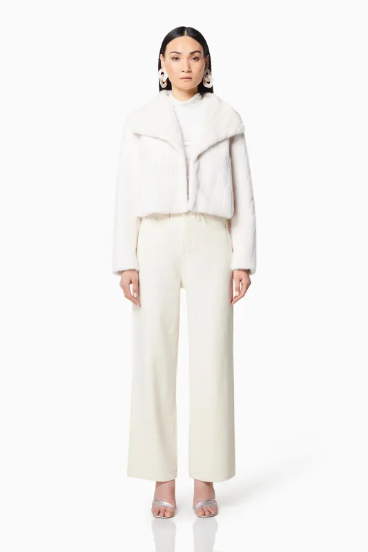 Fernie Cropped Faux Fur Jacket in White sold by Elliatt