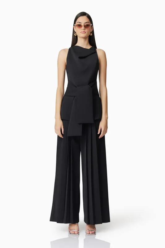CURAAE Noa Pleated Trousers in Black sold by Elliatt