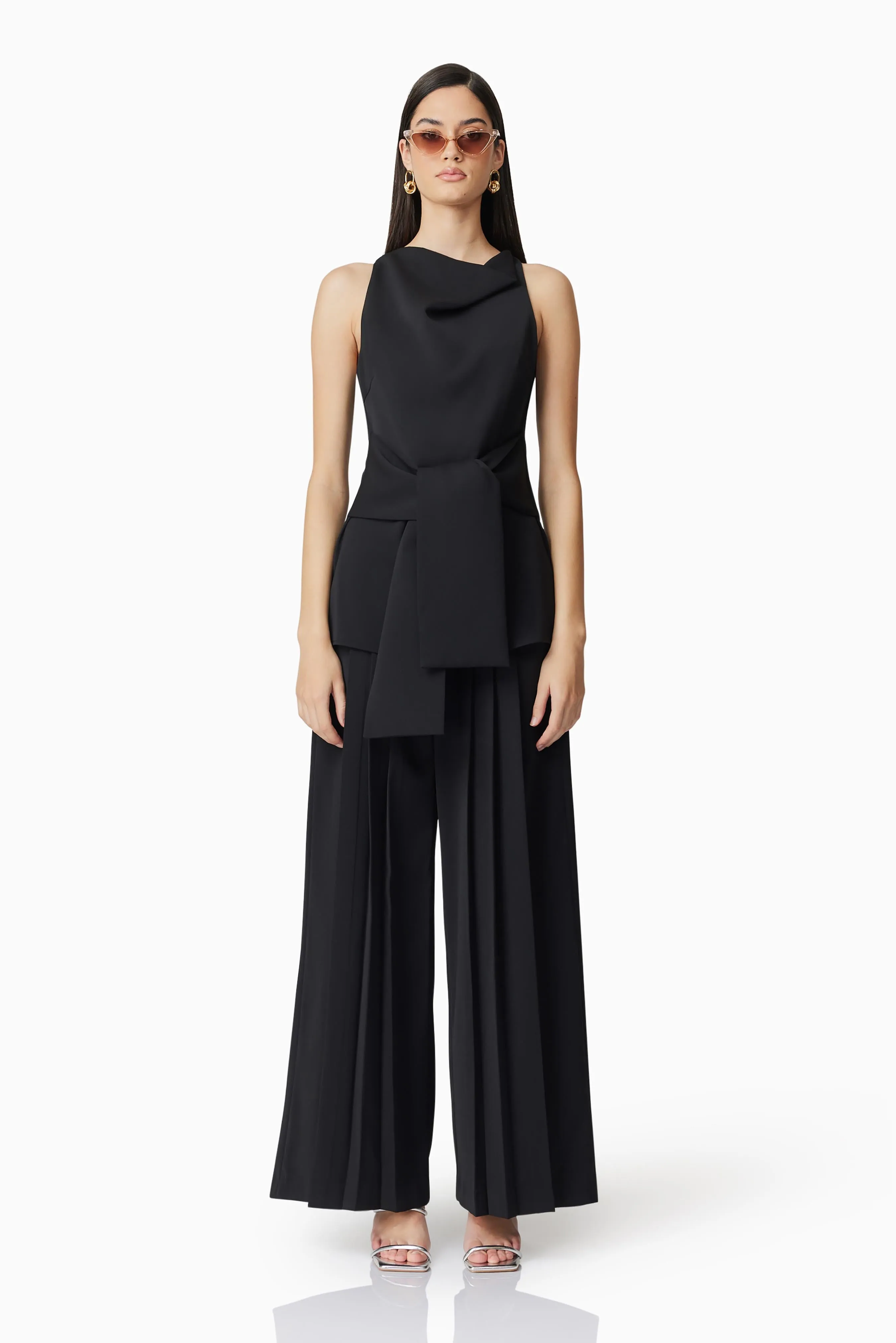 CURAAE Noa Pleated Trousers in Black sold by Elliatt