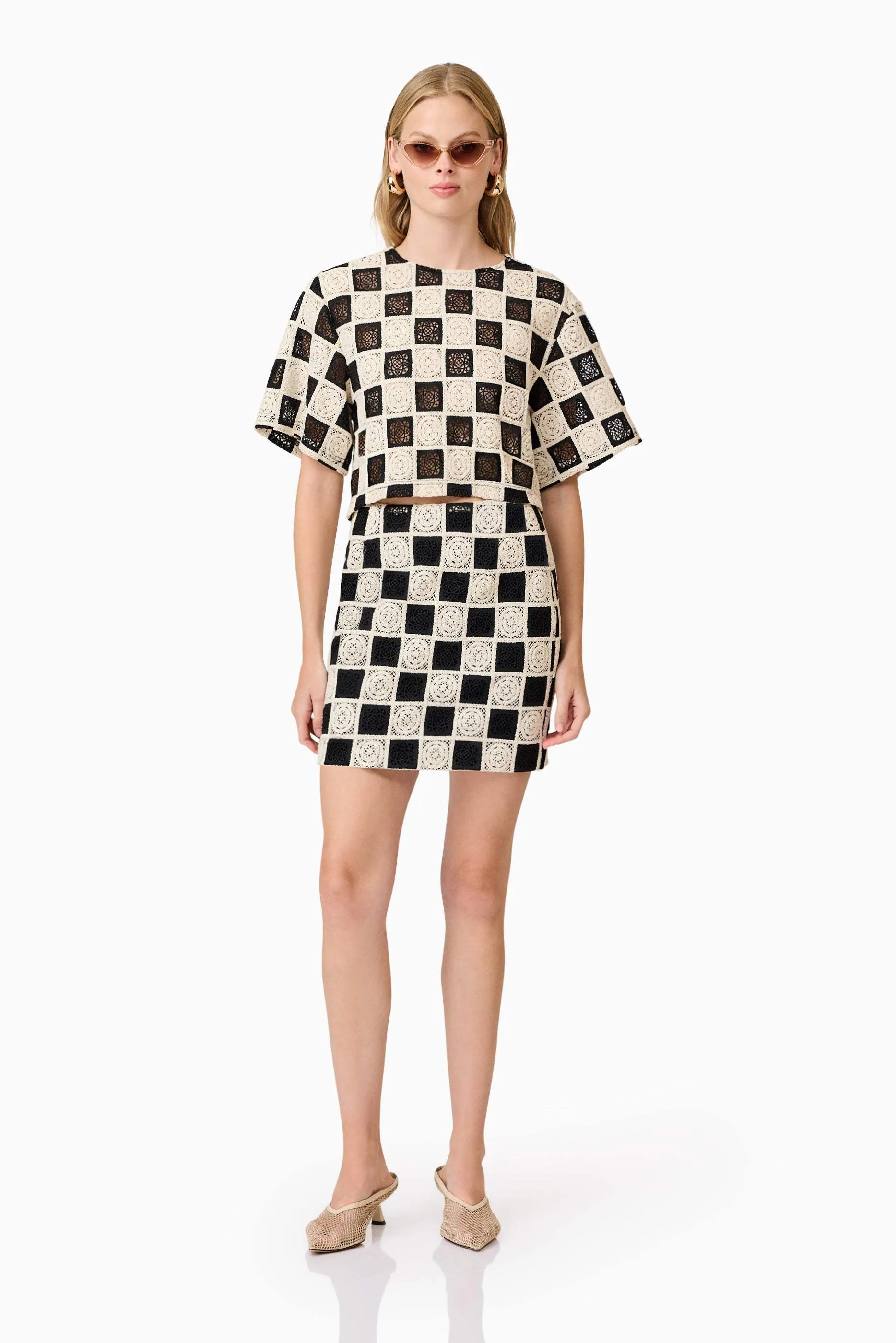 CURAAE Soho Crochet Mini Skirt in Black & White sold by Elliatt