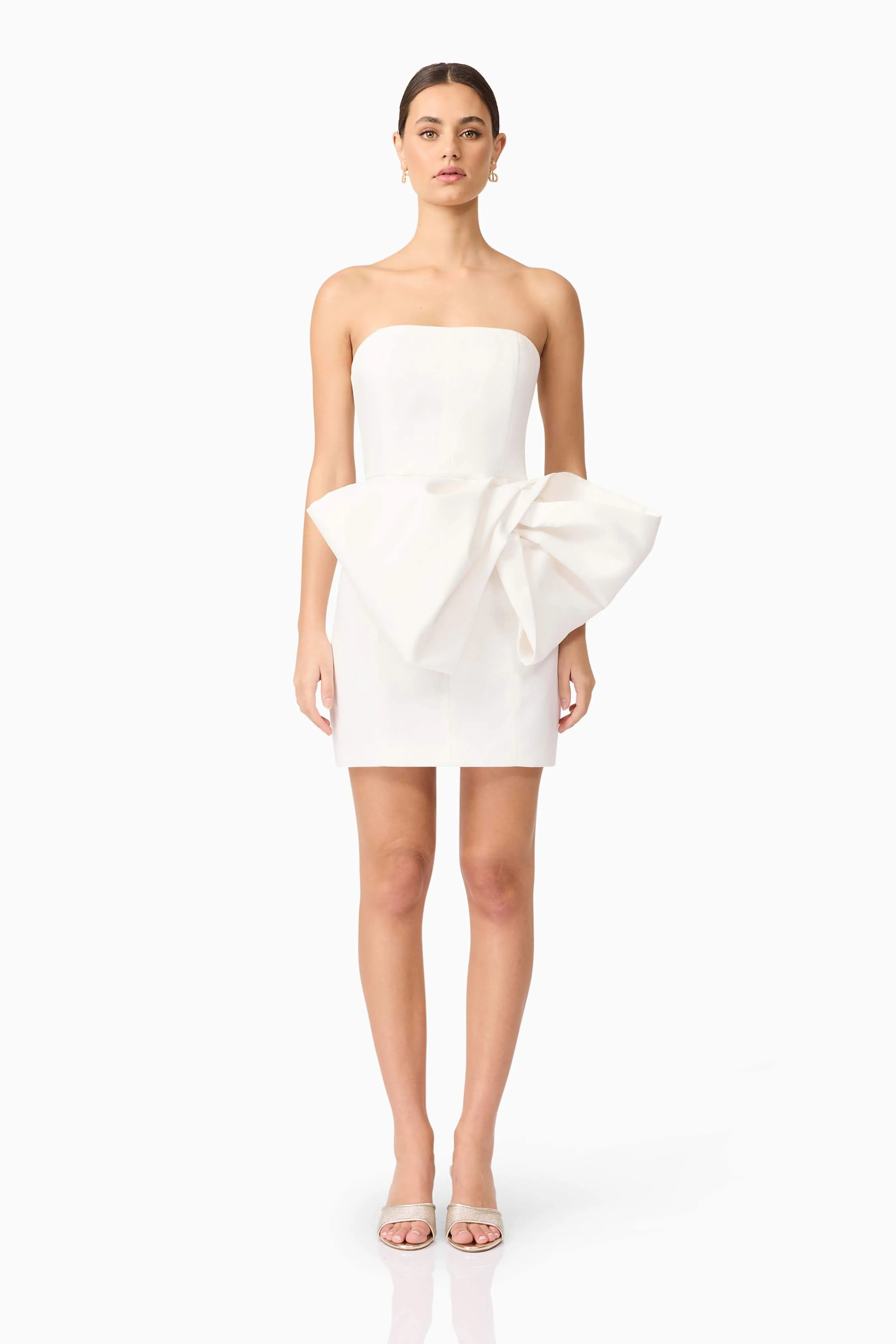Elysie Bow Mini Dress in White sold by Elliatt