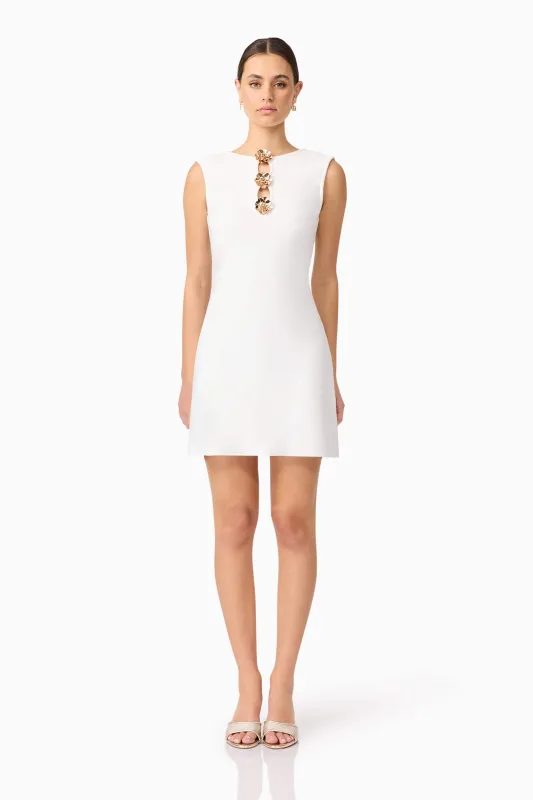 Celina Low Back Mini Dress in White sold by Elliatt