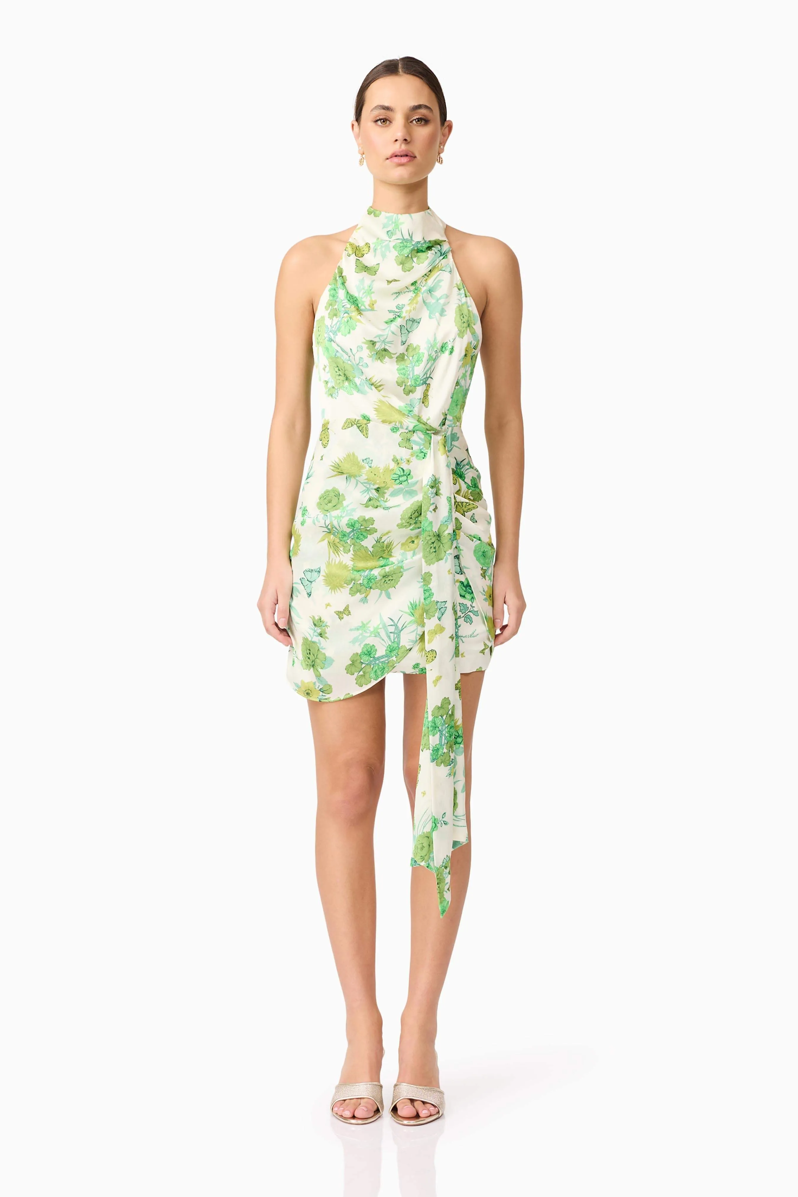 Tess Floral Halter Mini Dress in Green sold by Elliatt