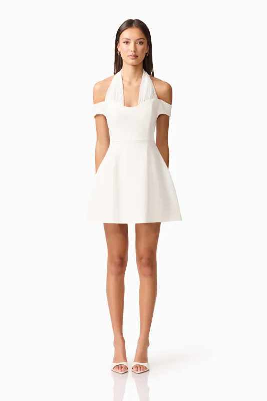Ruby Halter Mini Dress in White sold by Elliatt