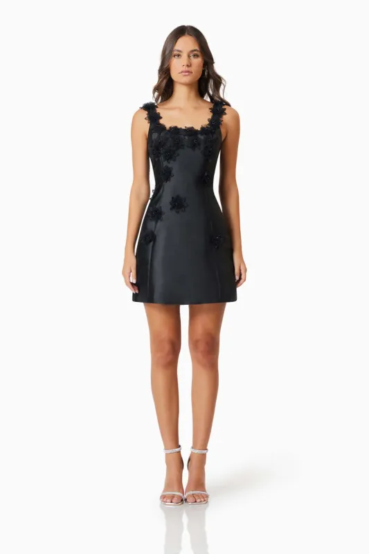 Elder Floral Decal Applique Mini Dress In Black sold by Elliatt