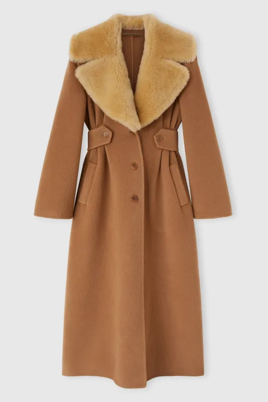 Long oversize coat in a blend of wool, virgin wool, and cashmere with alpaca fur lapel sold by Ermanno Scervino