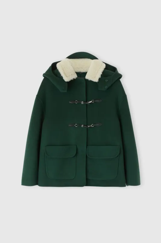 Pure virgin wool coat with real shearling collar and large hood sold by Ermanno Scervino
