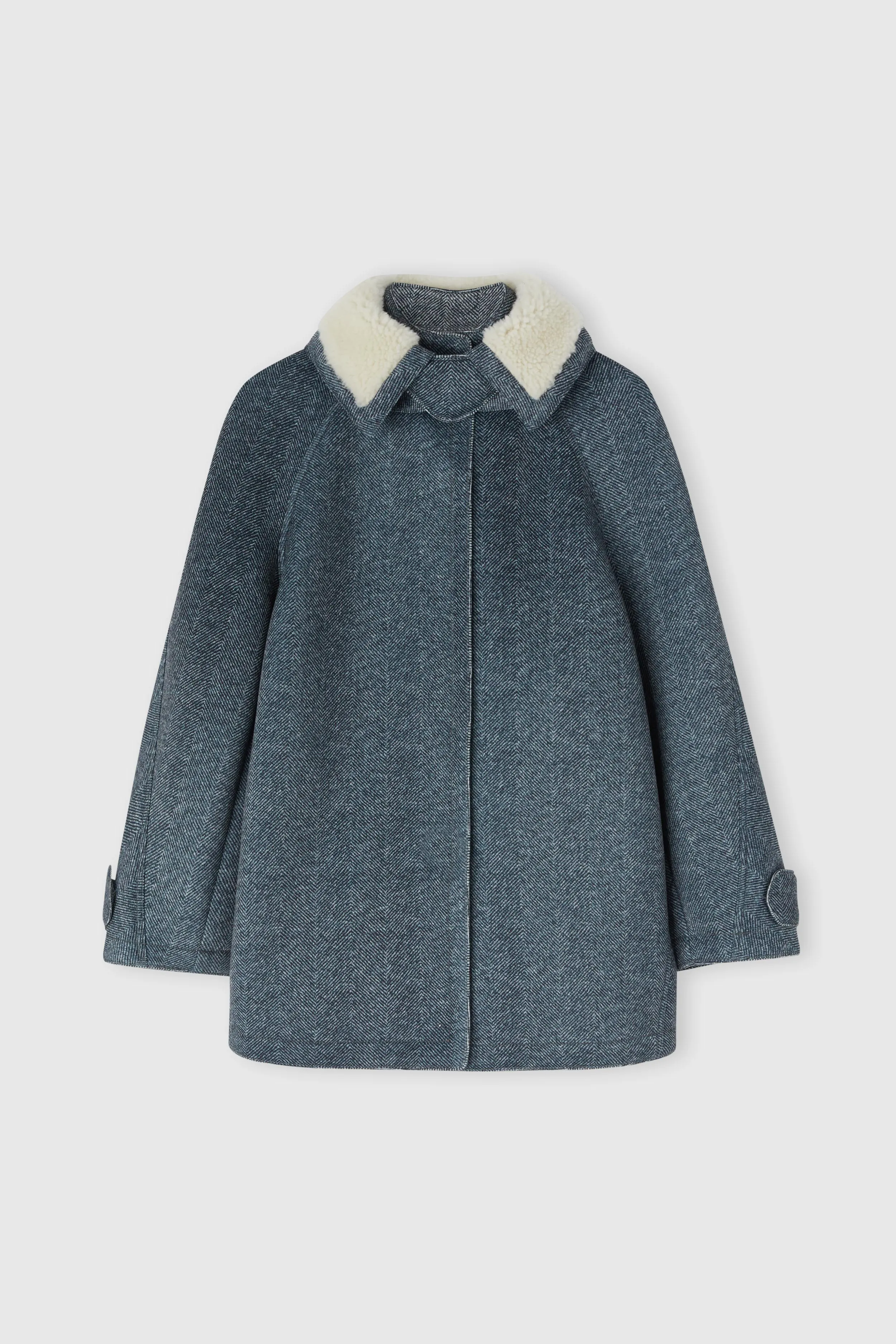 Over parka with zip and shearling collar sold by Ermanno Scervino
