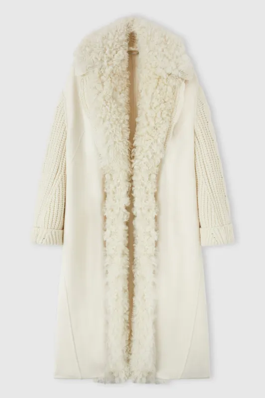Oversize coat in pure virgin wool with knitwear details and cruelty-free sheepskin fur sold by Ermanno Scervino